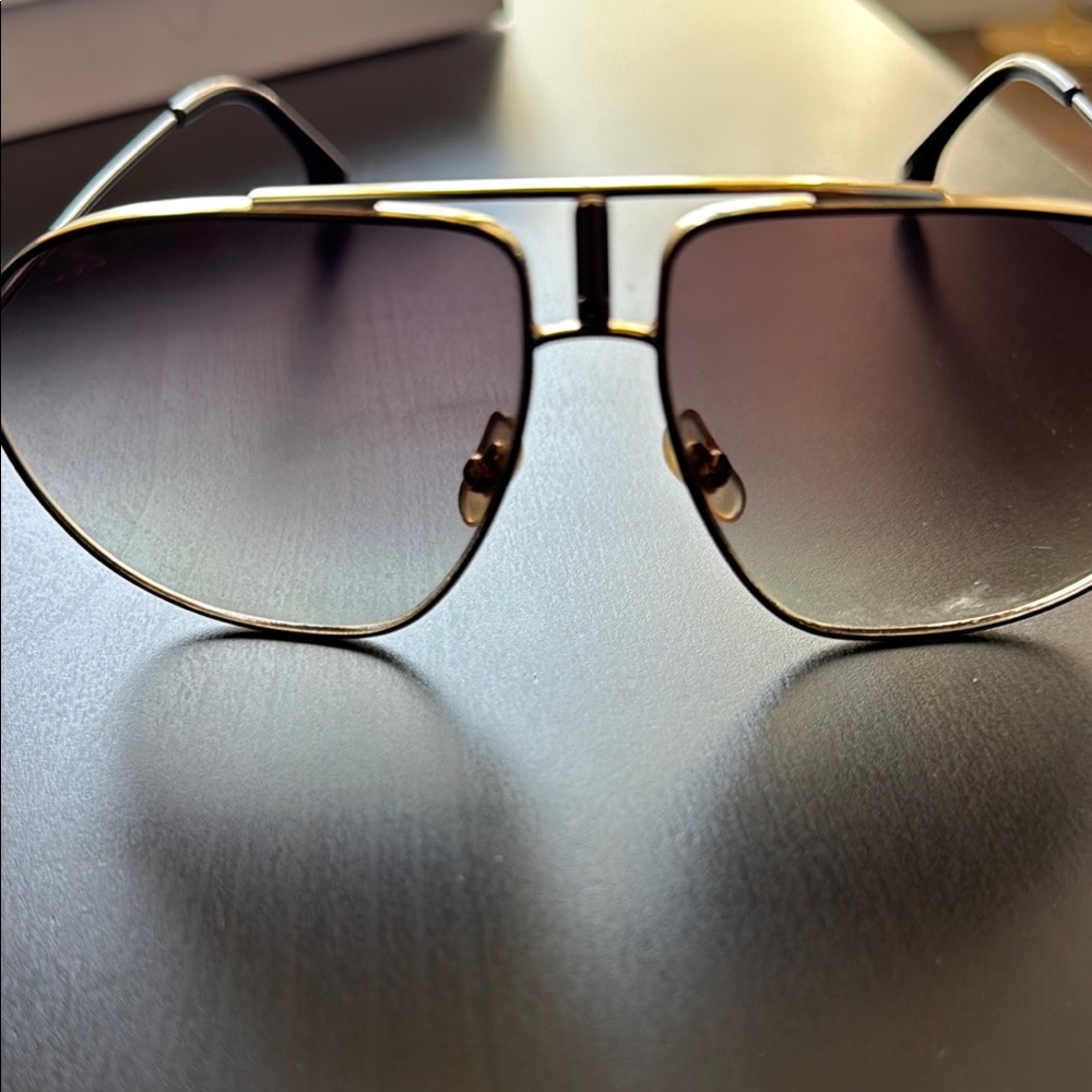 Carrera Gold Frame Sunglasses with Dark Lenses